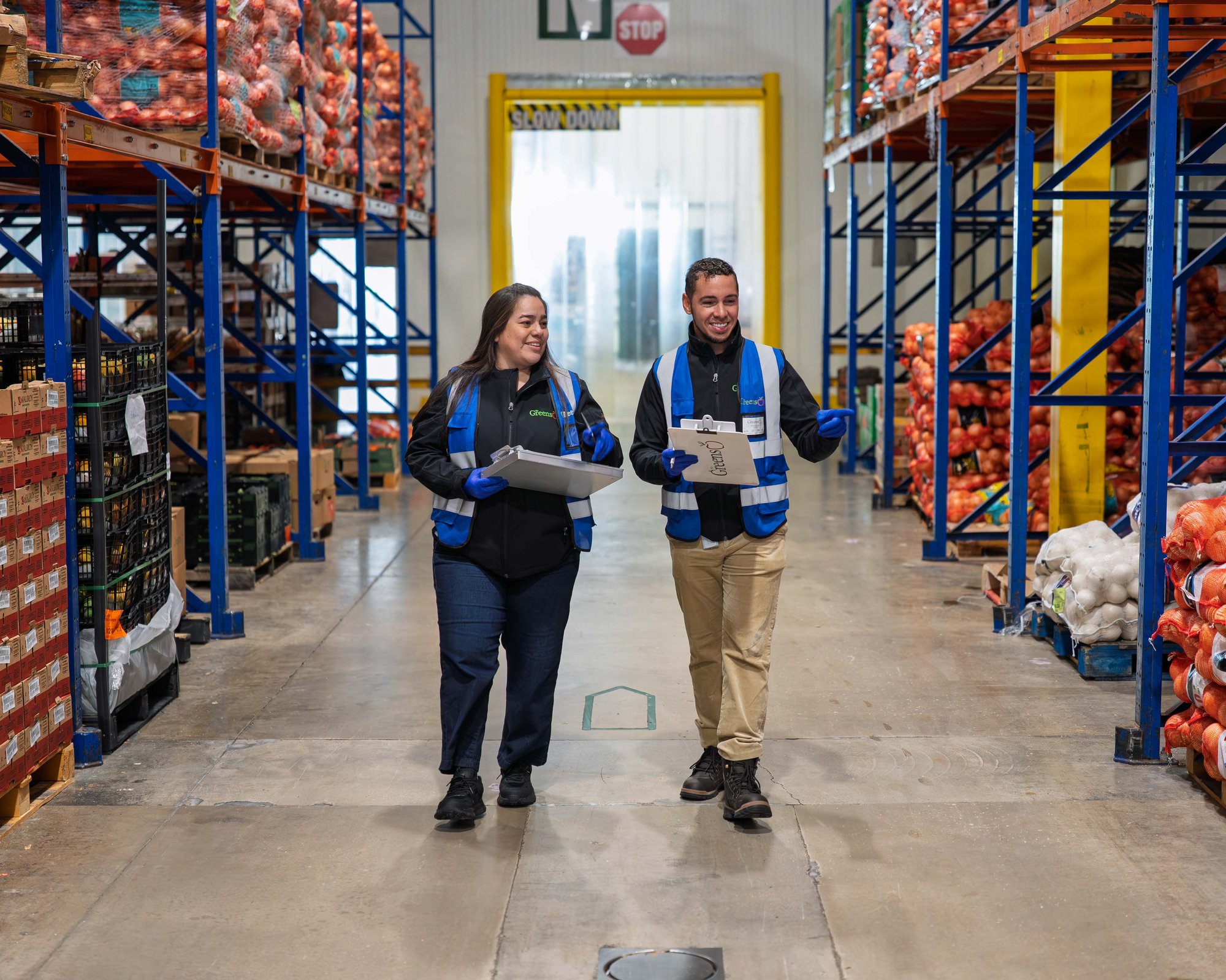 food safety employees walking through warehouse